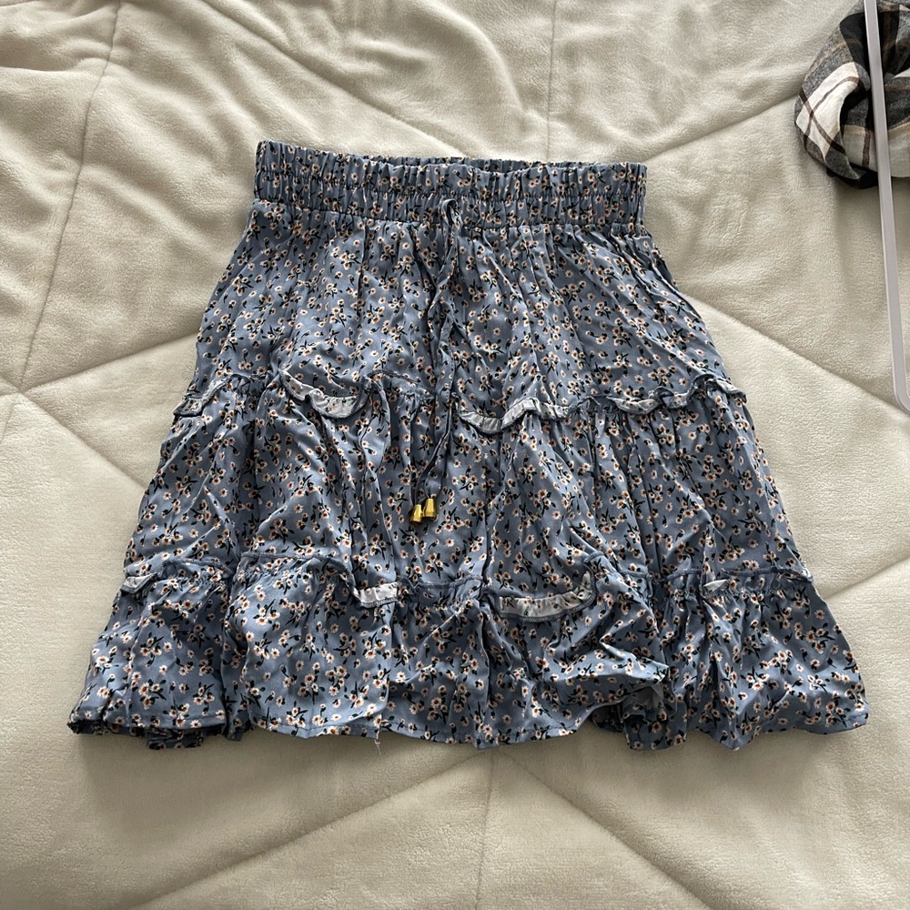 Francesca’s blue skirt